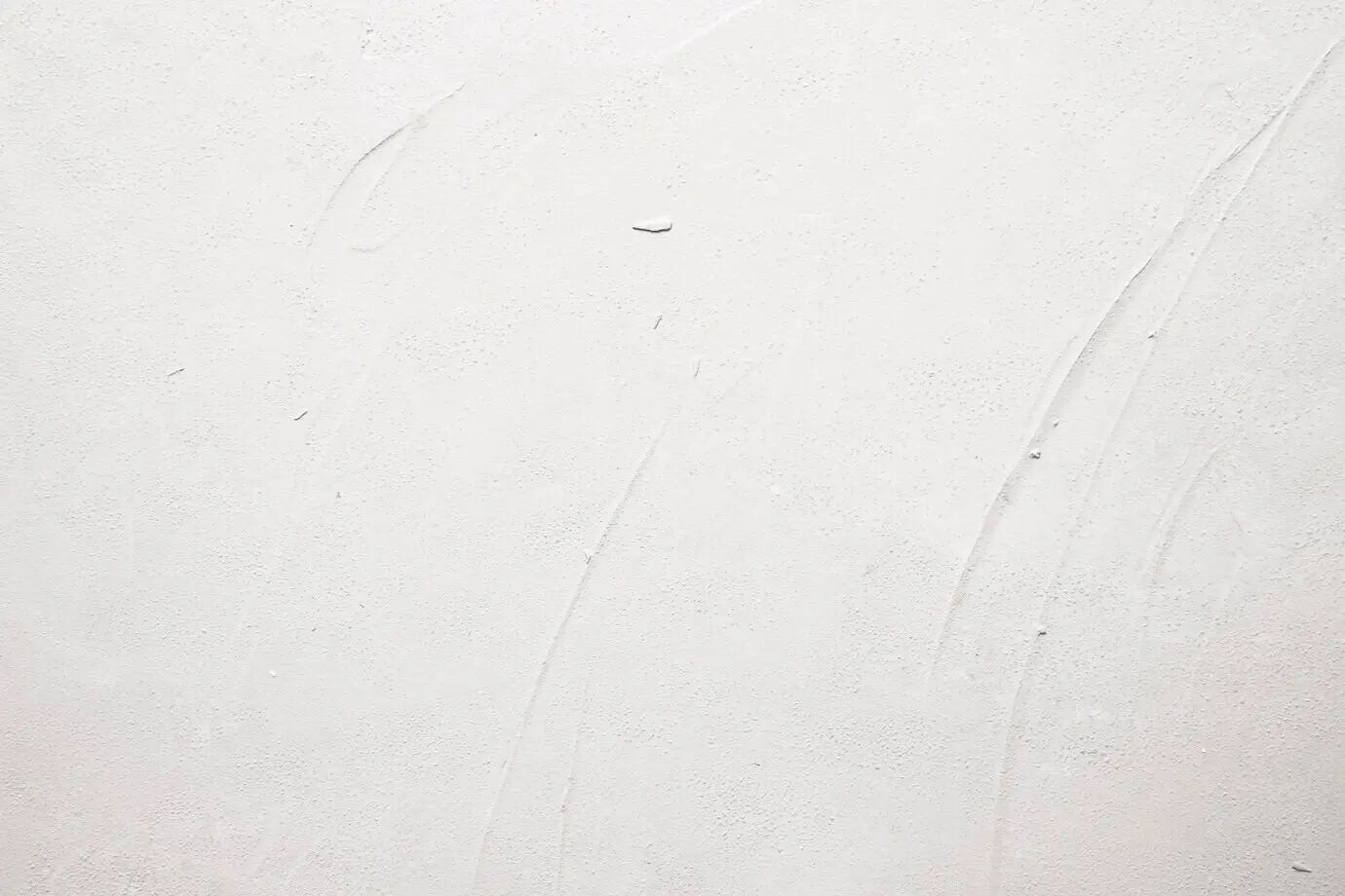 Close-up view of a white-painted wall